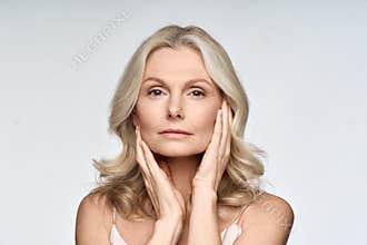 Portrait of beautiful 50 years old woman with perfect skin  on white.