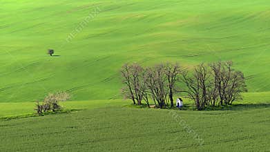 Beautiful spring landscape. Chapel of St. Barbara on the field with waves - Moravian Tuscany Czech Republic