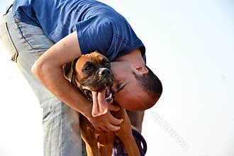 Boxer dog and his owner