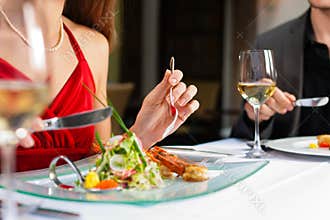 Couple eating dinner in very good restaurant