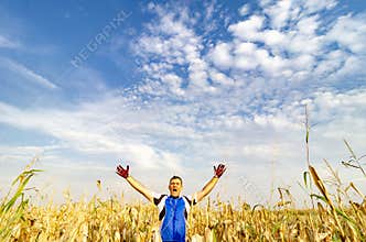 Happy mountain biker in the field