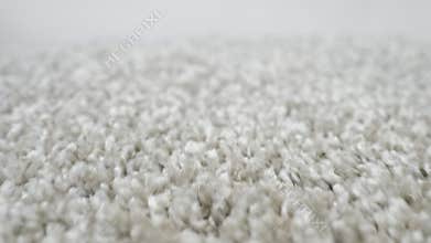 close-up of shaggy silver carpet camera movement