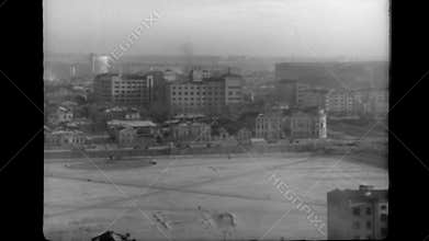 Retro aerial panoramic view of Sverdlovsk city and snow covered Iset river during USSR times. Stock footage. Vintage