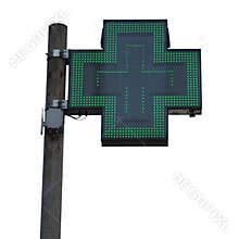 Green cross pharmacy sign isolated over white