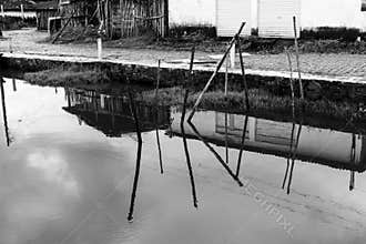 Reflection of a house in black and white