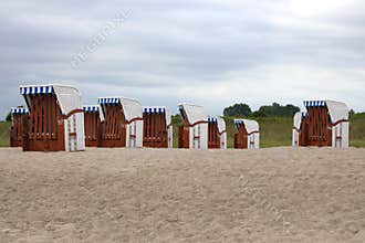Hooded beach chairs strandkorb at the Baltic seacoast