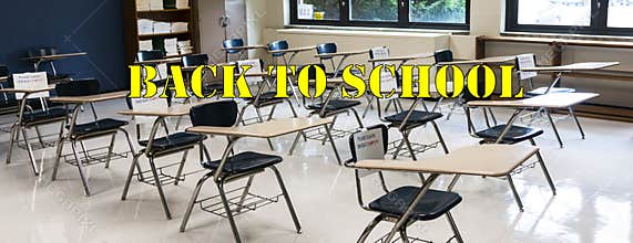 High school classroom ready for students to return with signs on chairs not to be used and back to school written in yellow