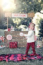 Boy with hot cocoa stand