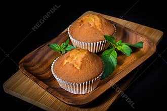 Muffins. With leaves fresher than mint.