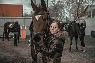 Teenagers harness village horses for agricultural work