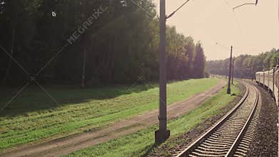 view from the train window in Russia economy class electric train in summer