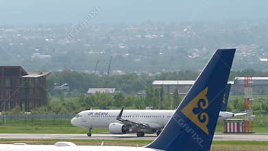Airbus A321 of Air Astana takeoff at Almaty airport