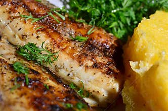 Mamaliga with grilled fish