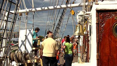 Tourists boarding tall ship