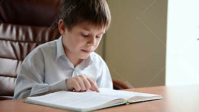 Child reads the book