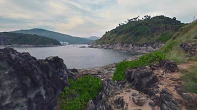 Water reflecting sky, mountains create serene landscape with fluid lake