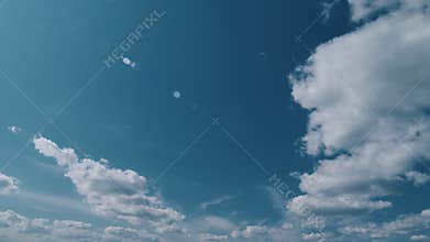 Vast Blue Sky And Clouds. White Curly Clouds In Blue Sky. Beautiful Blue Sky And Clouds.