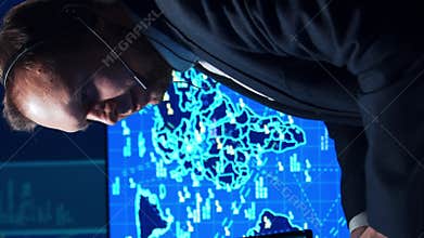 Workplace of the air traffic controllers in the control tower. Team of professional aircraft control officers works