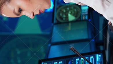 Workplace of the air traffic controllers in the control tower. Team of professional aircraft control officers works