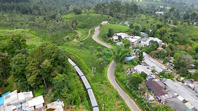train runs through the beautiful scenic tea hills