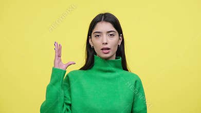 Woman In Boredom Making Blah Blah Gesture Over Yellow Background