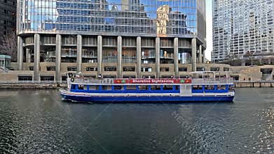 A Tourist Boat Passes in Front of the Trump International Hotel and Tower