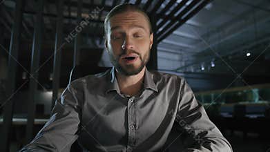 Friendly positive Caucasian businessman teacher online tutor business man employer adviser consultant at night evening