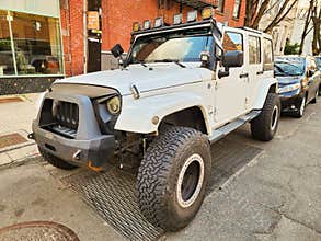 New York City, USA - March 18, 2024: Jeep Wrangler JK luxury sportscar outdoor, corner view