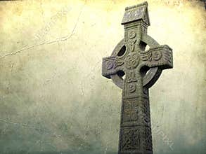 Celtic cross isolated on a grunge textured background