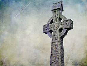 Celtic cross isolated on a grunge textured background