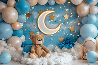 A baby room with a teddy bear and a blue and white theme