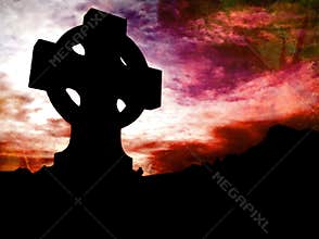 Celtic cross silhouette on a dramatic sunset like red colour grunge textured background