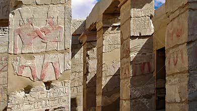 Karnak Temple, two rows of pillars in the court of Thutmosis IV.with cultural representations of the king before the god