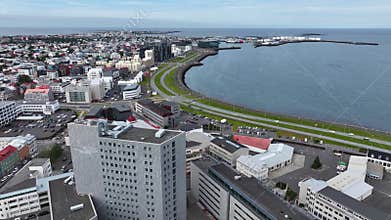 Drone Shot of Reykjavik, iceland, Apartment Buildings and Coastal Street Traffic