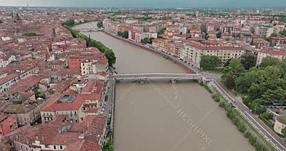 Aerial view of city landscape of Verona on both banks of the Adige river, Italy
