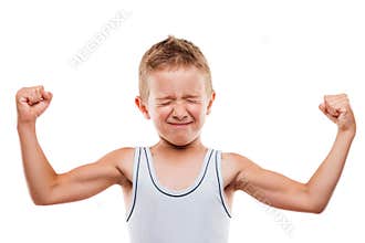 Smiling sport child boy showing hand biceps muscles strength