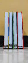 four stacked books ready to be read
