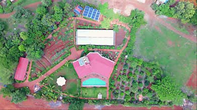 Aerial view of a bungalow with gardens