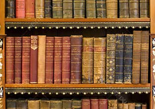 Lots of old books in a library