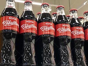 Coca-Cola local brand replica bottles on shelfs in Russia