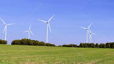 Renewable energy wind turbine in peaceful natural environment