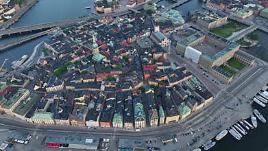 Aerial view of Stockholm old town. Flying over the bay. Amazing drone footage of Stockholm yacht canal