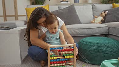 Mother and toddler playing with abacus on the floor of a cozy living room showing love and interaction at home