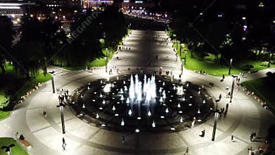 Aerial circle fountain on night Freedom Square