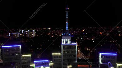 Aerial night illuminated Derzhprom building scene
