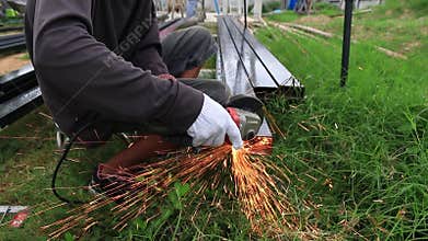 Workers are using steel cutting tools