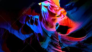 Sunbeam illuminating colorful antelope canyon rock formations