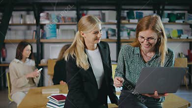 Professional women in modern offices focus on teamwork, technology, collaboration, and digital tools to enhance