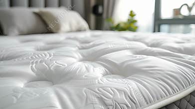 An image of the elastic corners of the mattress pad ensuring a snug and secure fit on any mattress size