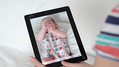 Filming baby with digital tablet